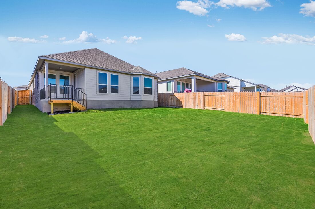 220 Wingstem Way Georgetown, TX 78633 - Photo 17 of 35 a front view of a house with a yard and garage