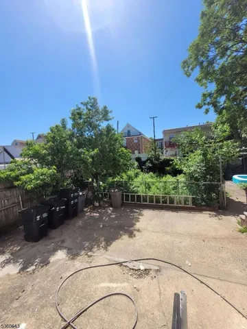 a view of a garden with a bench
