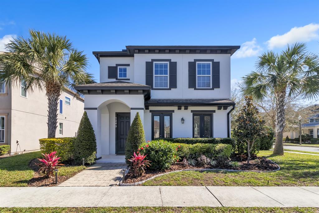 7249 Rambling Water Way Windermere, FL 34786 - Photo 1 of 1 a front view of a house with a yard