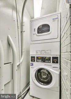 a room with lots of furniture and window