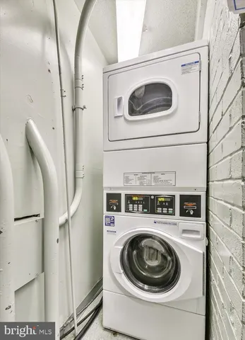 a room with lots of furniture and window