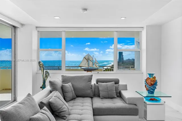 a living room with furniture and a window