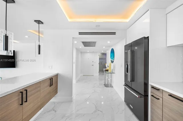 a view of a kitchen with a sink
