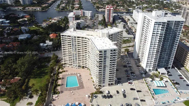 a view of a swimming pool from a balcony