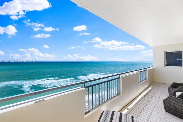 a view of balcony with ocean view