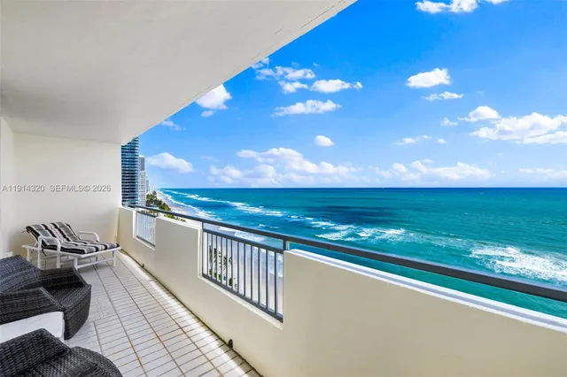 a view of a balcony with an outdoor space