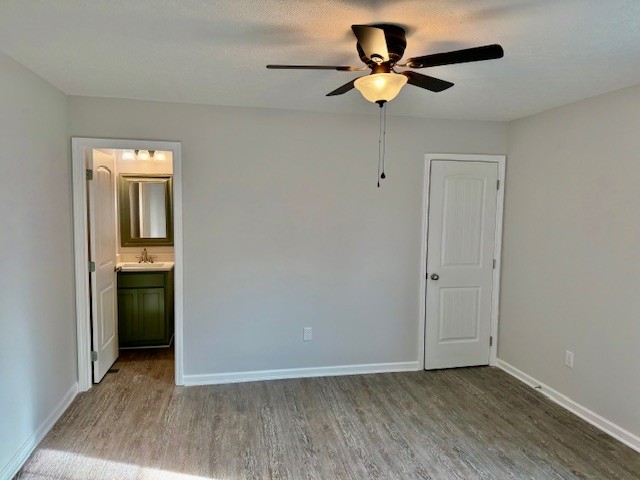 4214 Riley Creek Road Normandy, TN 37360 - Photo 26 of 35 a view of an empty room with cabinet and a ceiling fan
