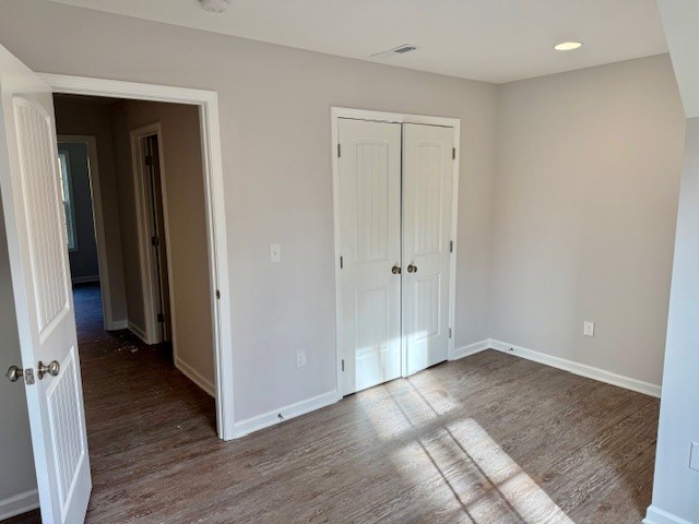 4214 Riley Creek Road Normandy, TN 37360 - Photo 32 of 35 a view of an empty room with wooden floor and closet