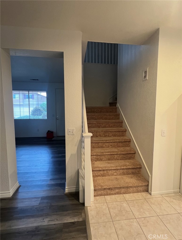 40 Partisan Place Irvine, CA 92602 - Photo 12 of 16 a view of entryway and hall with wooden floor