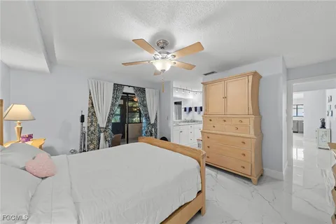 a bathroom with a granite countertop sink mirror and double