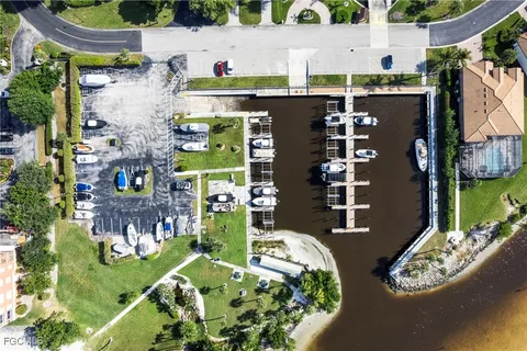 a view of a swimming pool with a yard