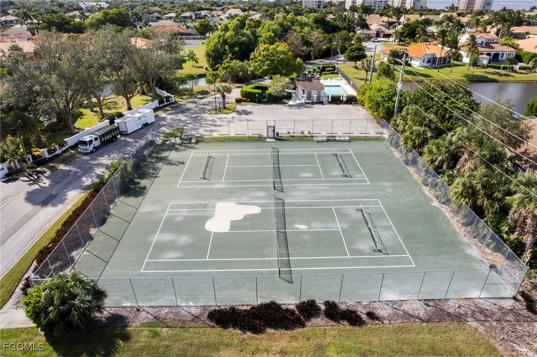 11650 Pointe Circle Fort Myers, FL 33908 - Photo 29 of 40 a view of a swimming pool with a yard