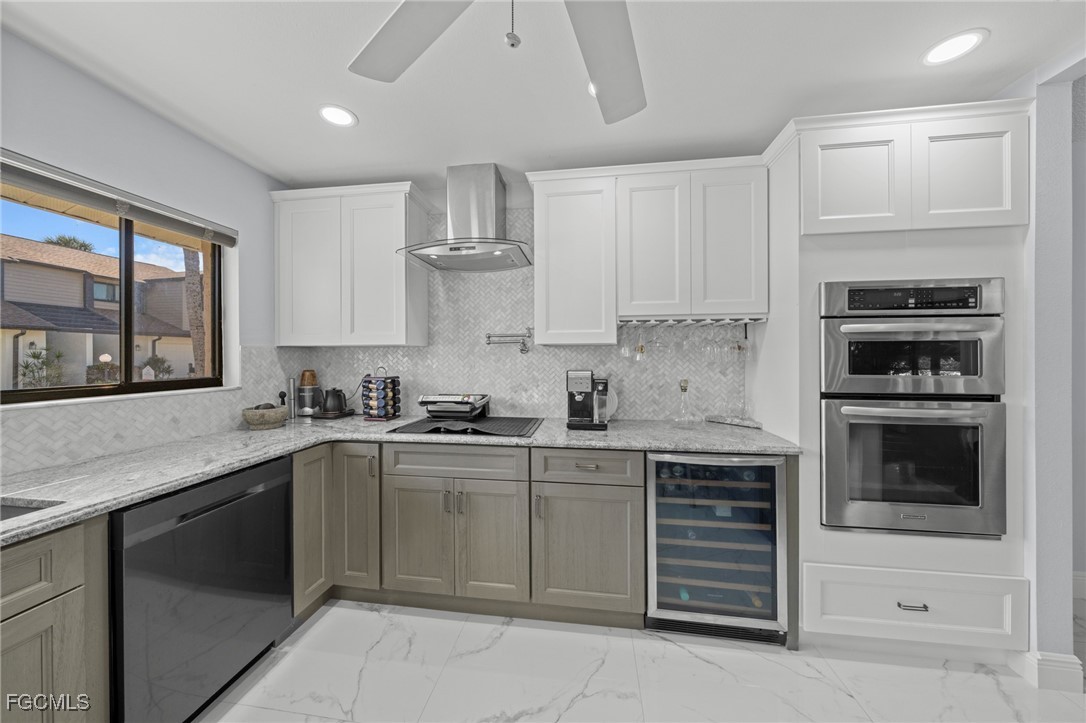 11650 Pointe Circle Fort Myers, FL 33908 - Photo 9 of 40 a kitchen with a sink stove and cabinets