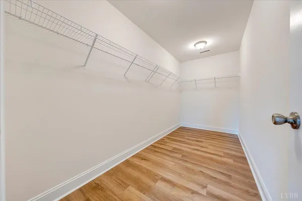 a view of a room with racks on the wall