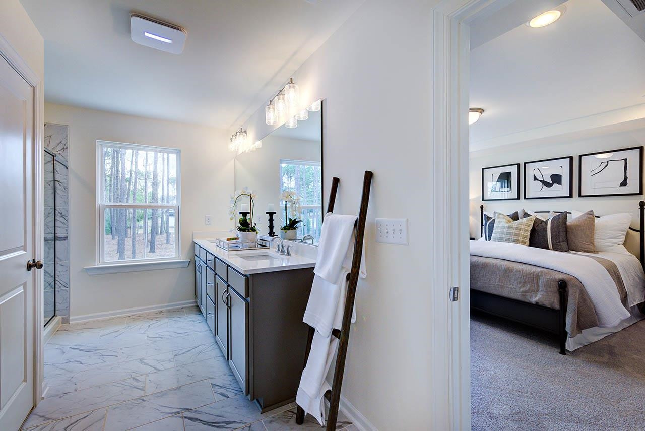 931 Baldwin Rdg Road Apex, NC 27523 - Photo 27 of 42 a view of bedroom with furniture and window