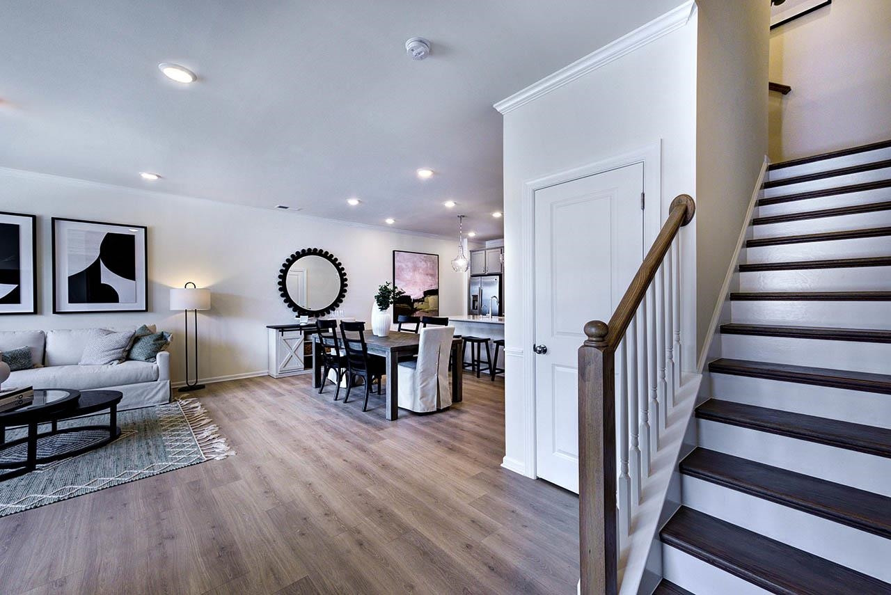 931 Baldwin Rdg Road Apex, NC 27523 - Photo 30 of 42 a living room with furniture and a wooden floor