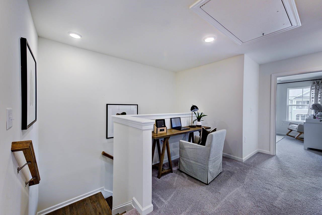 931 Baldwin Rdg Road Apex, NC 27523 - Photo 33 of 42 a living room with furniture and a couch