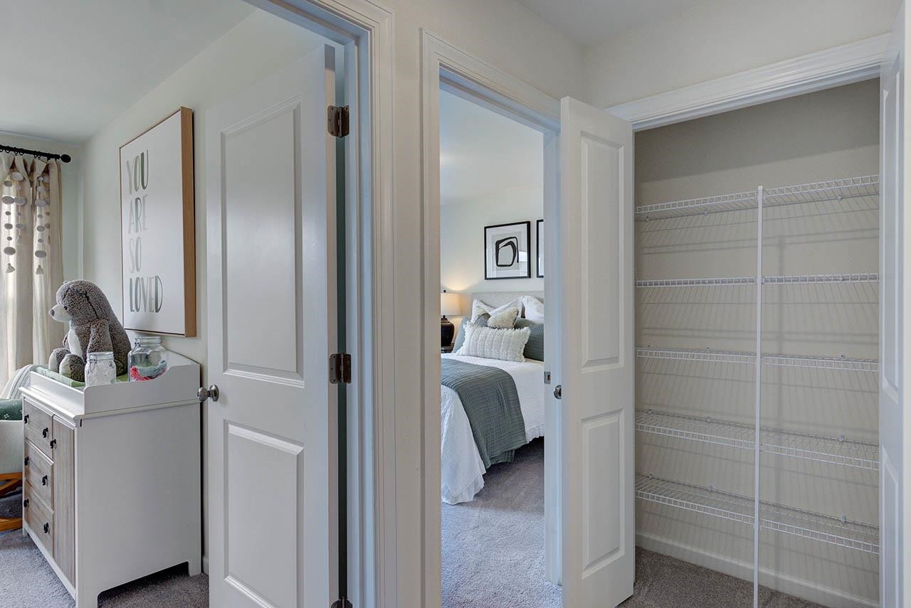 931 Baldwin Rdg Road Apex, NC 27523 - Photo 39 of 42 a en suite bathroom with a sink and mirror