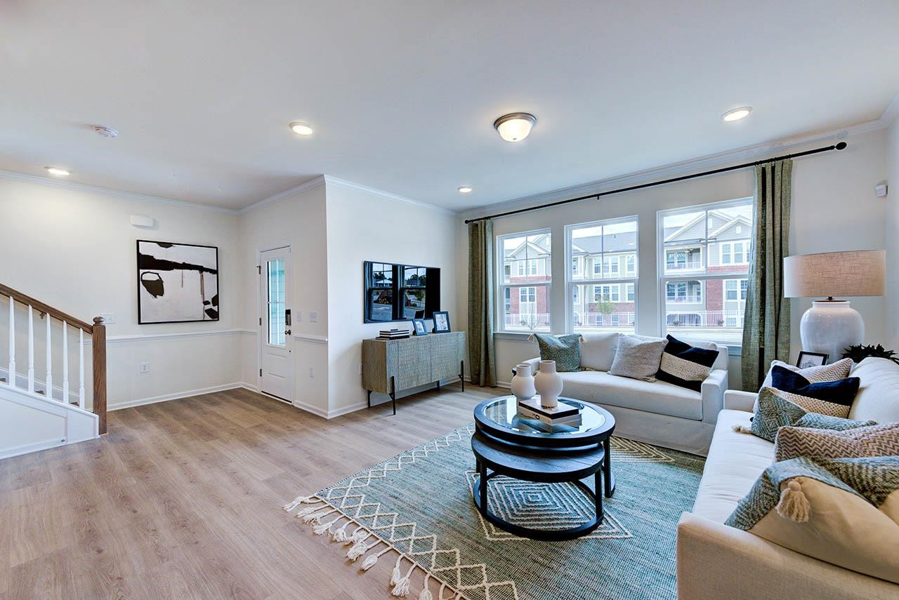 931 Baldwin Rdg Road Apex, NC 27523 - Photo 7 of 42 a living room with furniture and a large window