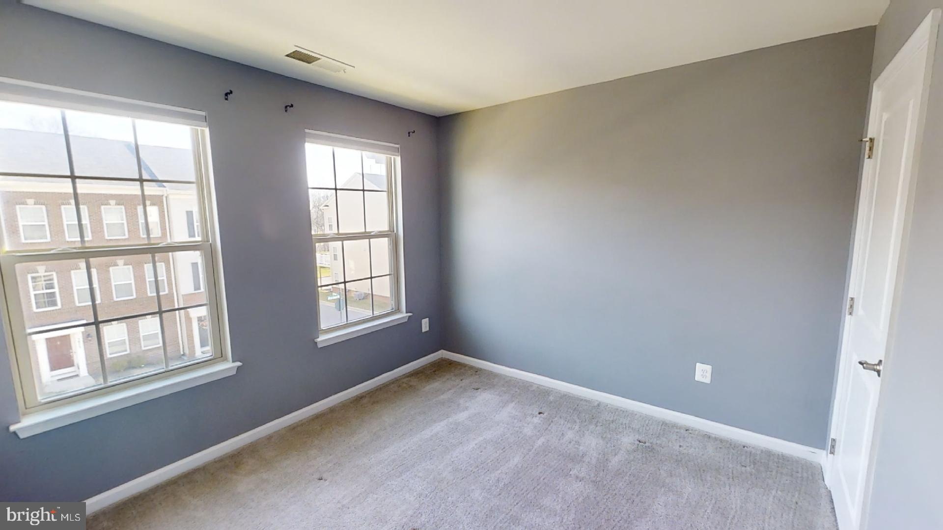 5974 Jefferson Commons Way Frederick, MD 21703 - Photo 12 of 16 a view of an empty room with a window
