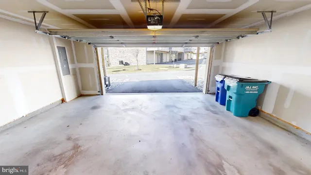a view of a hallway with wooden walls