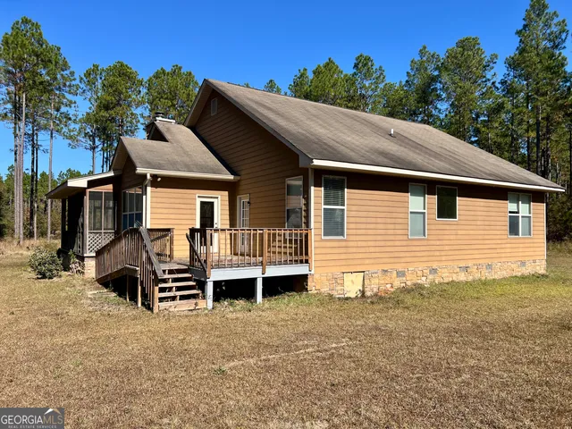 a view of a gym area with gym equipment