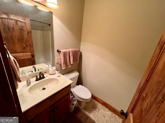 a view of a garden with a tree