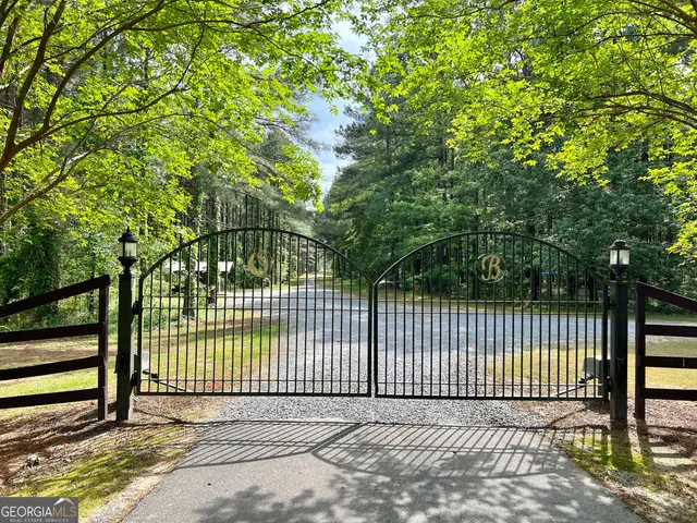 a view of a field with an trees