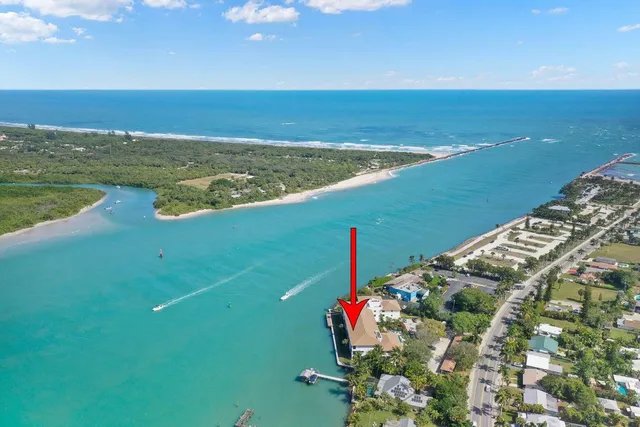 an aerial view of a house with a garden