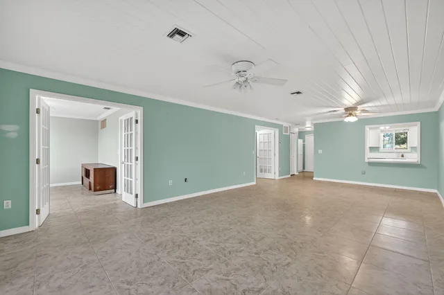 a view of a bathroom with a glass shower door