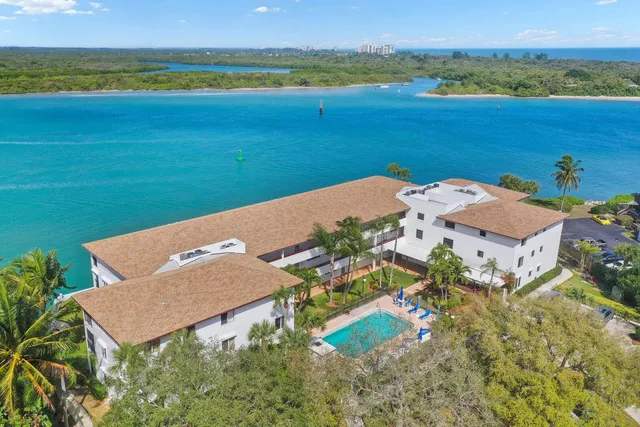 an aerial view of a house with a garden