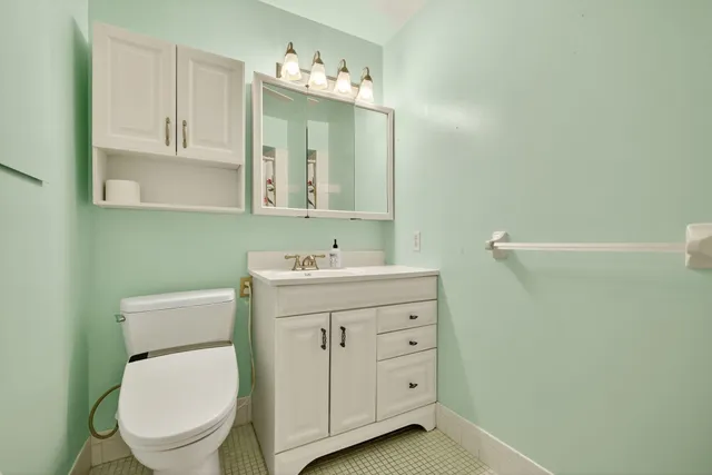 a view of a terrace with a garden and chair