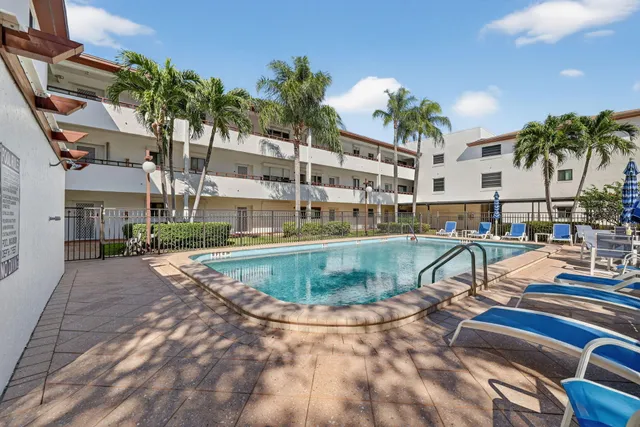 a utility room with sink dryer and washer
