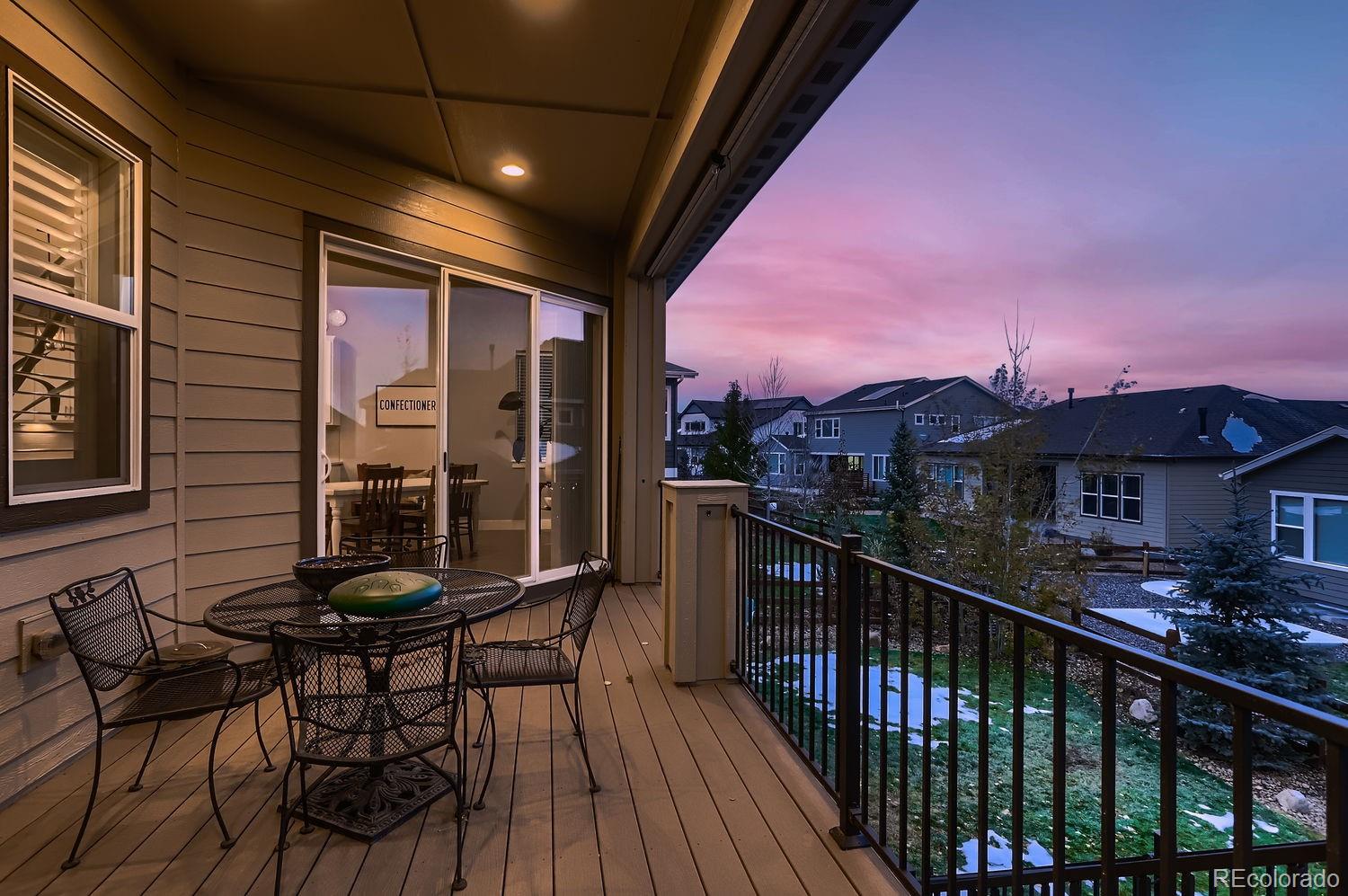 9452 Gore Loop Arvada, CO 80007 - Photo 24 of 30 a view of a chairs and table in the balcony