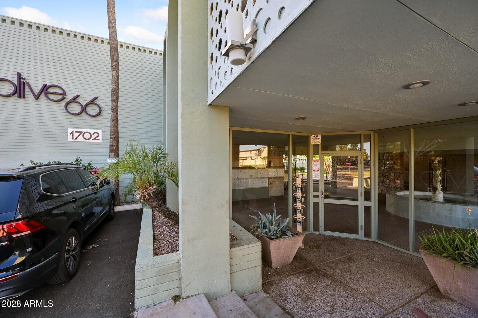 1702 West Tuckey Lane, Unit 212 Phoenix, AZ 85015 - Photo 2 of 20 a view of a entryway door front of house