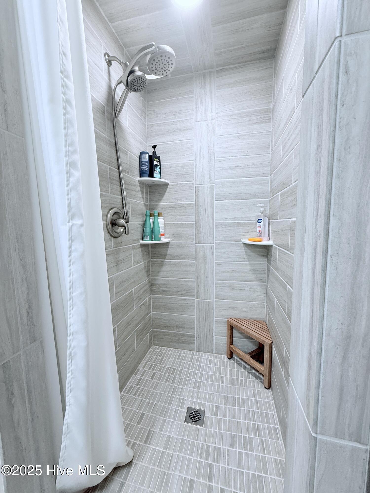 5405 Cedar Tree Lane Emerald Isle, NC 28594 - Photo 57 of 67 Downstairs walk-in shower