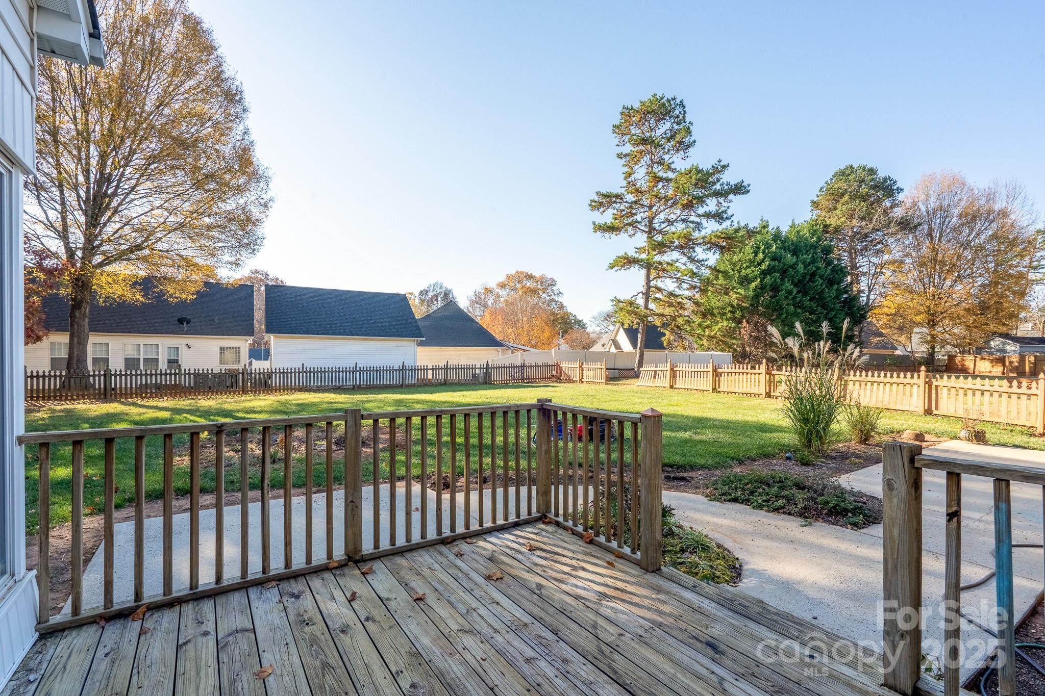 621 Peacehaven Road Kannapolis, NC 28083 - Photo 14 of 44 a view of a pathway with a wrought fence