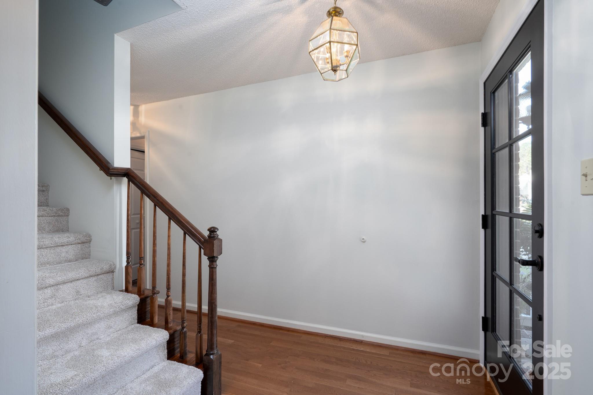 621 Peacehaven Road Kannapolis, NC 28083 - Photo 21 of 44 a view of entryway with wooden floor and stairs