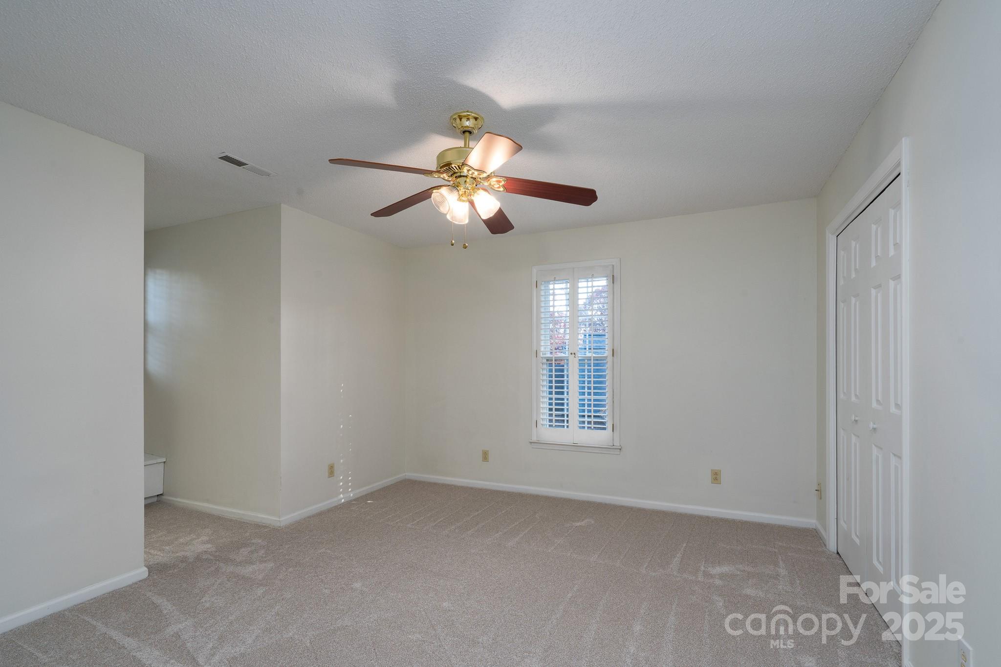 621 Peacehaven Road Kannapolis, NC 28083 - Photo 25 of 44 a view of an empty room with a window