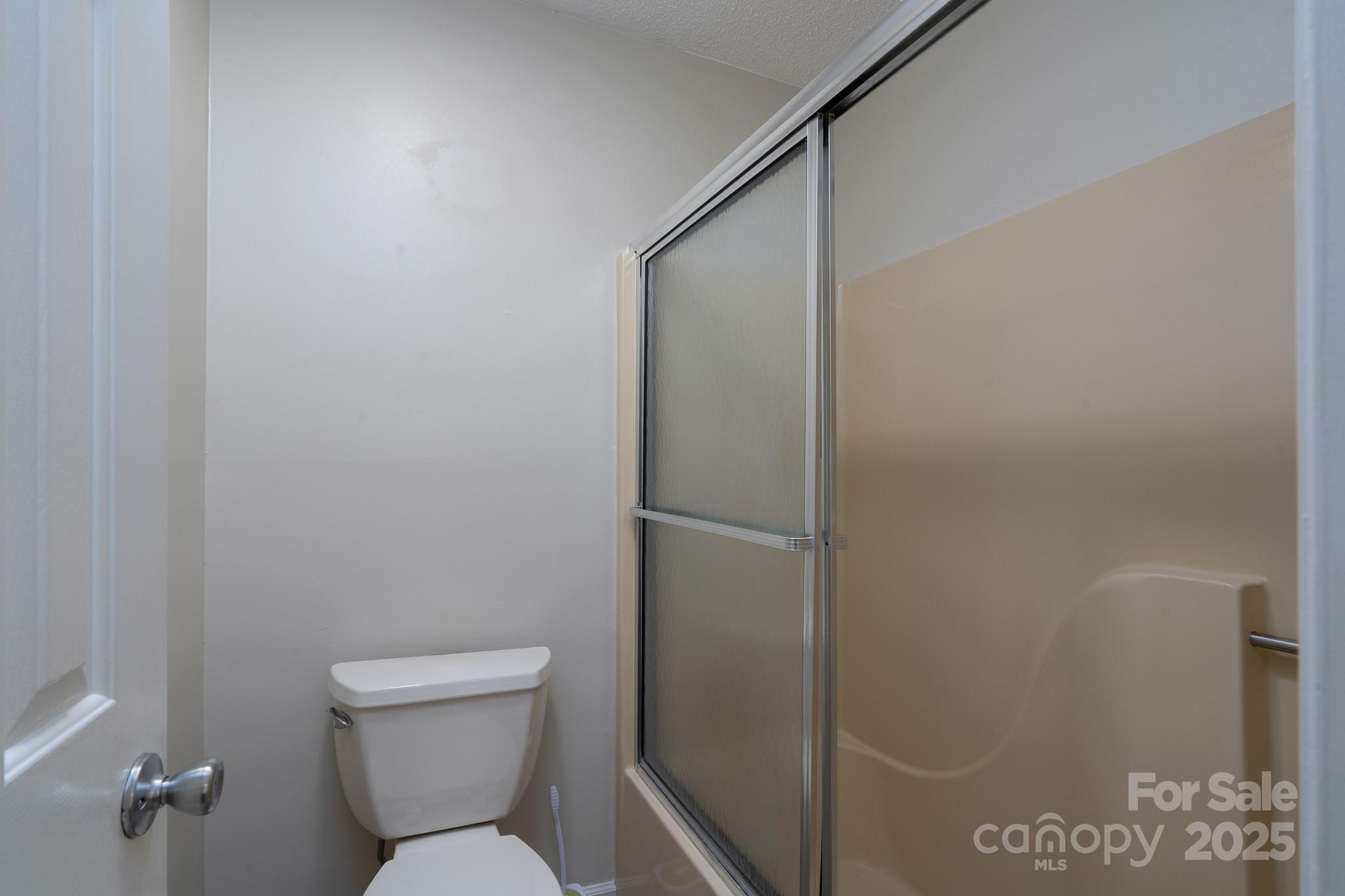 621 Peacehaven Road Kannapolis, NC 28083 - Photo 27 of 44 a bathroom with a toilet and a shower