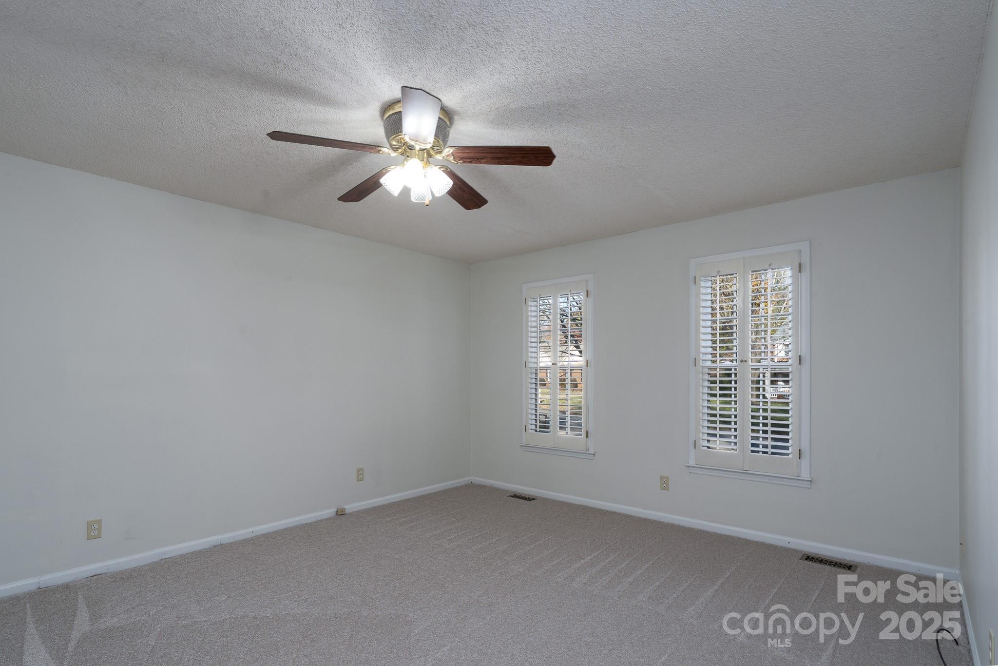 621 Peacehaven Road Kannapolis, NC 28083 - Photo 31 of 44 a view of empty room with windows