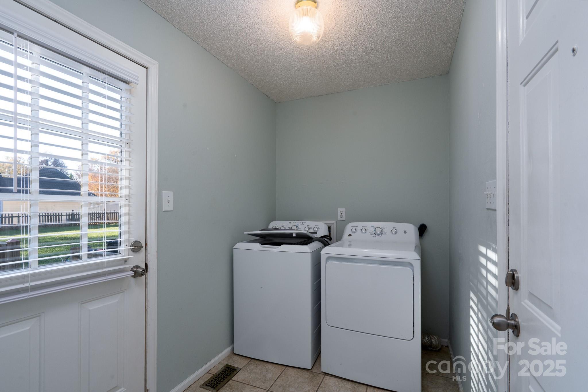 621 Peacehaven Road Kannapolis, NC 28083 - Photo 39 of 44 a utility room with dryer and washer
