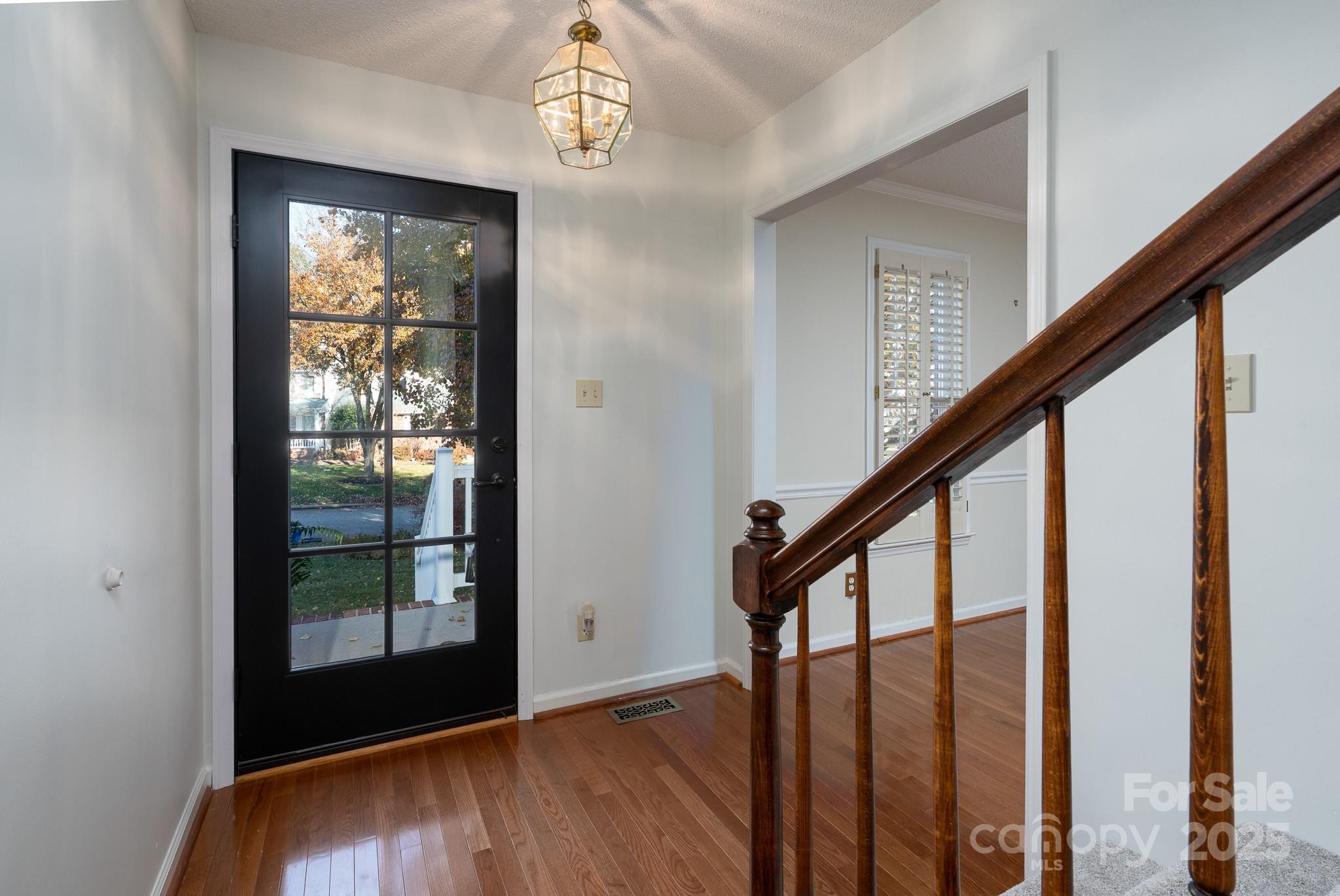 621 Peacehaven Road Kannapolis, NC 28083 - Photo 41 of 44 a view of an entryway with wooden floor and door