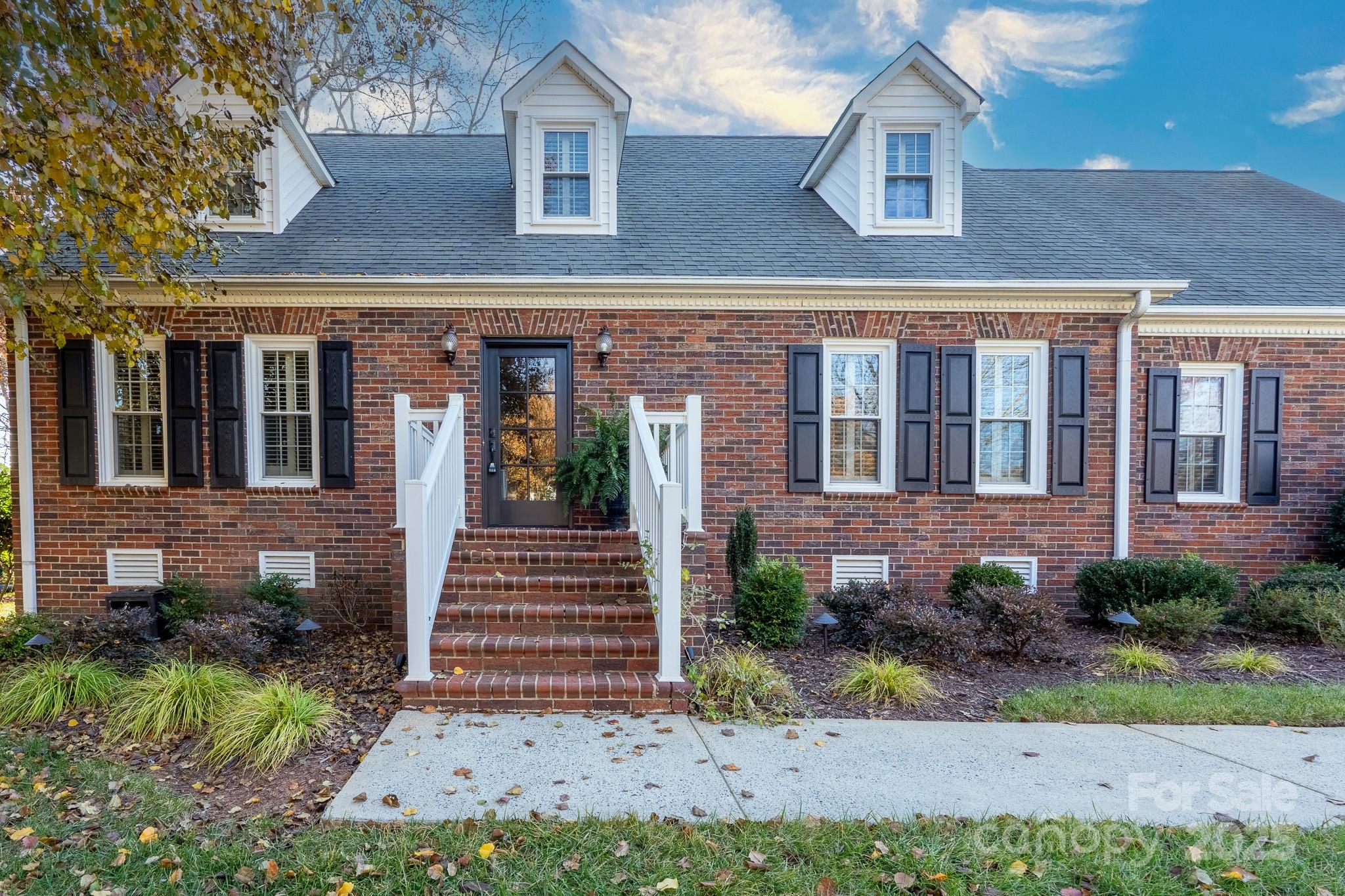 621 Peacehaven Road Kannapolis, NC 28083 - Photo 9 of 44 a front view of a house with garden