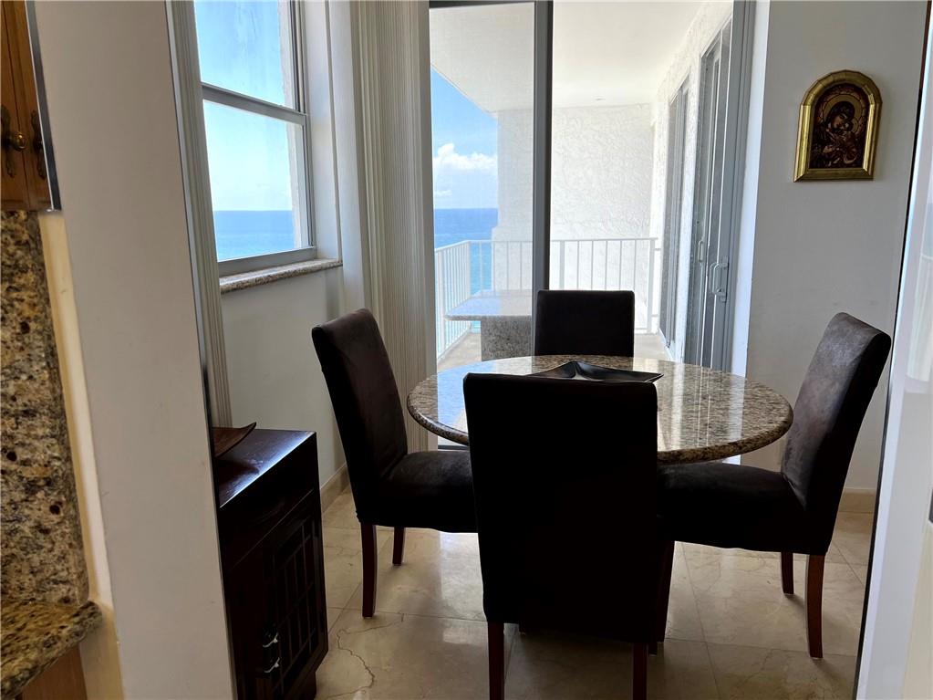 1010 South Ocean Boulevard, Unit PH12 Pompano Beach, FL 33062 - Photo 14 of 47 a view of a workspace with furniture