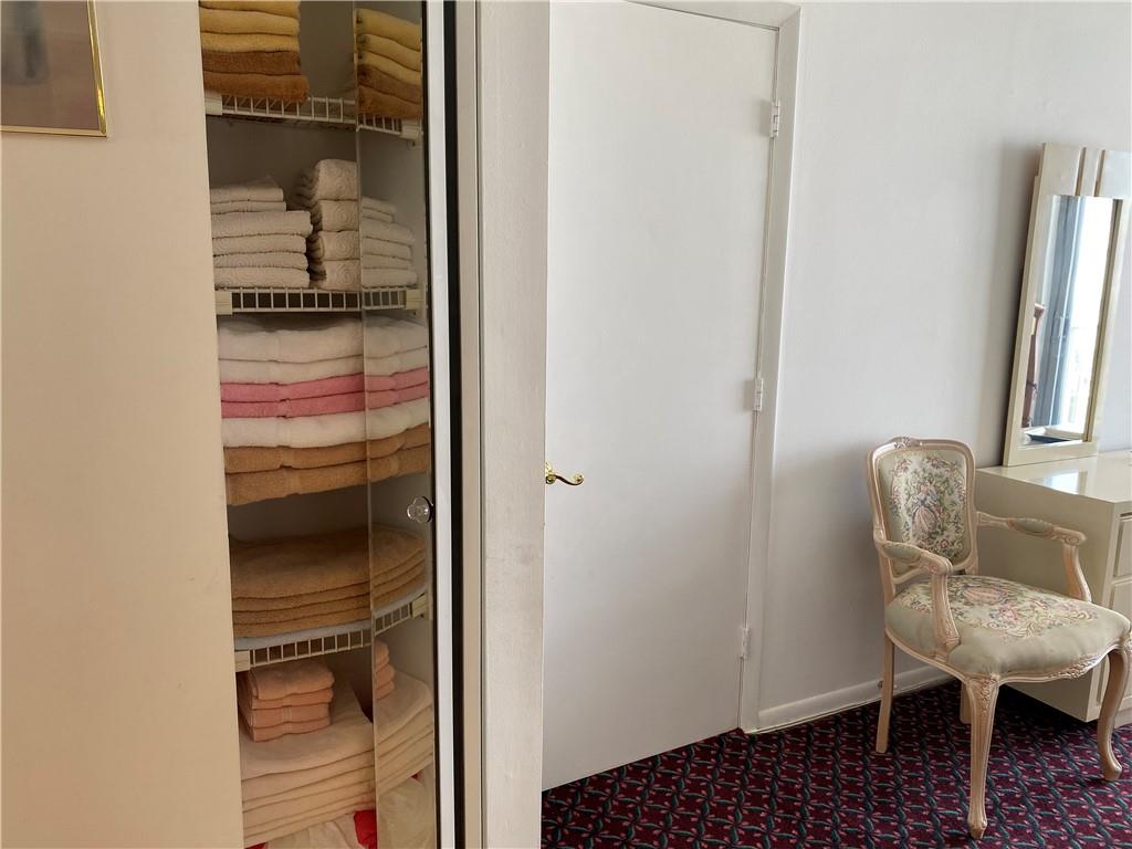 1010 South Ocean Boulevard, Unit PH12 Pompano Beach, FL 33062 - Photo 22 of 47 a room with furniture and a window