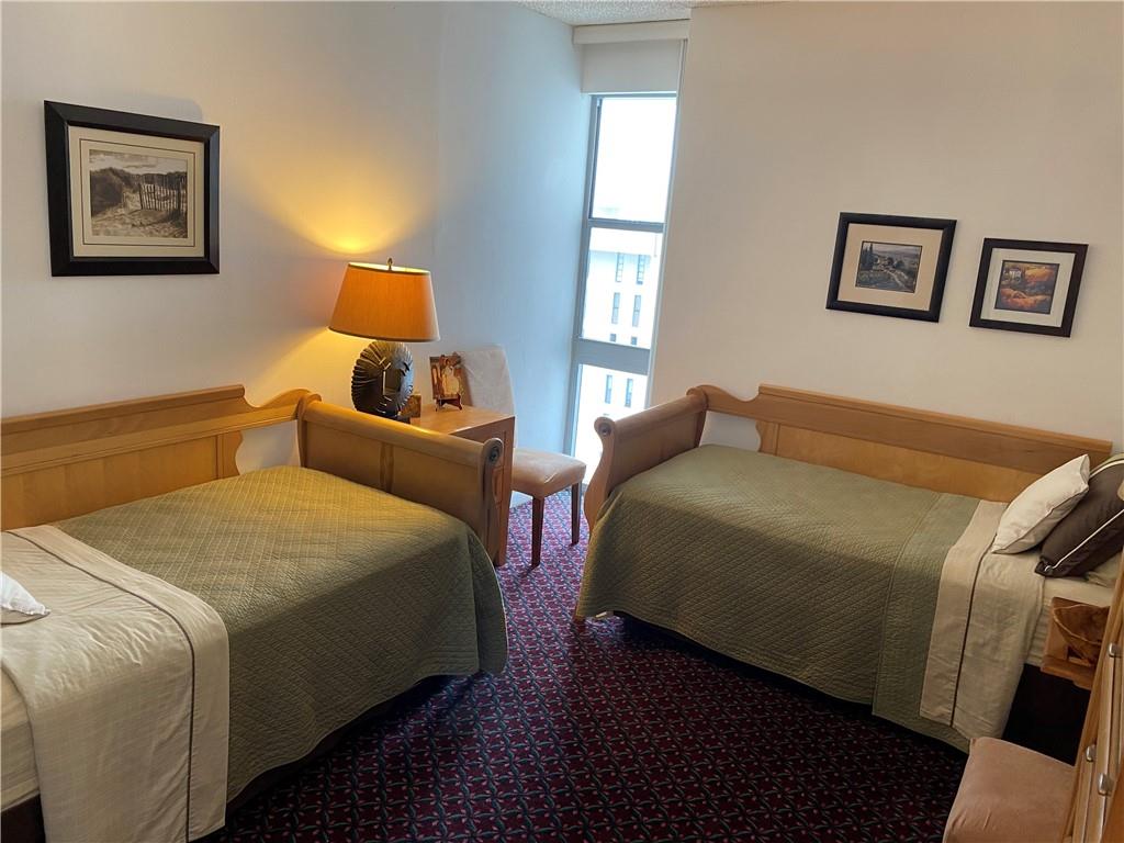 1010 South Ocean Boulevard, Unit PH12 Pompano Beach, FL 33062 - Photo 24 of 47 a bedroom with bed and window