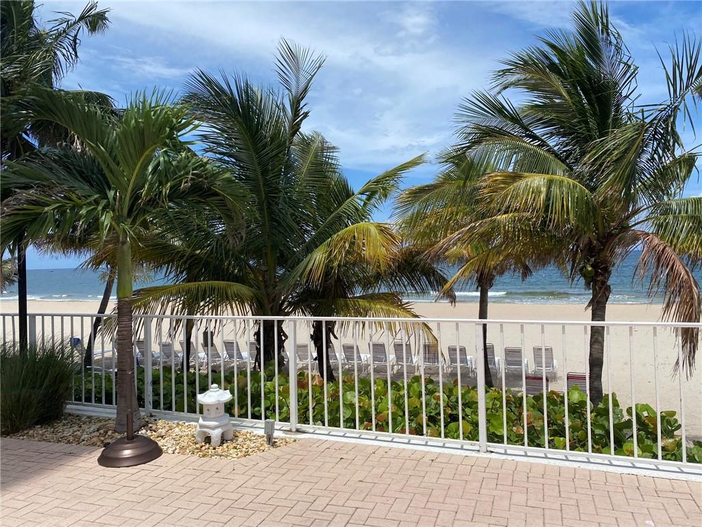 1010 South Ocean Boulevard, Unit PH12 Pompano Beach, FL 33062 - Photo 32 of 47 a view of a park with a palm tree