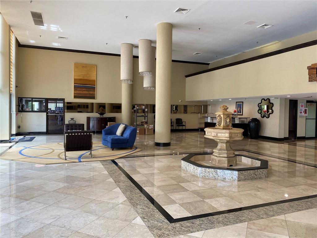 1010 South Ocean Boulevard, Unit PH12 Pompano Beach, FL 33062 - Photo 36 of 47 a living room with furniture and a table