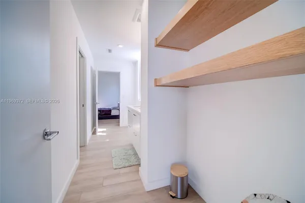 a view of a balcony with plants